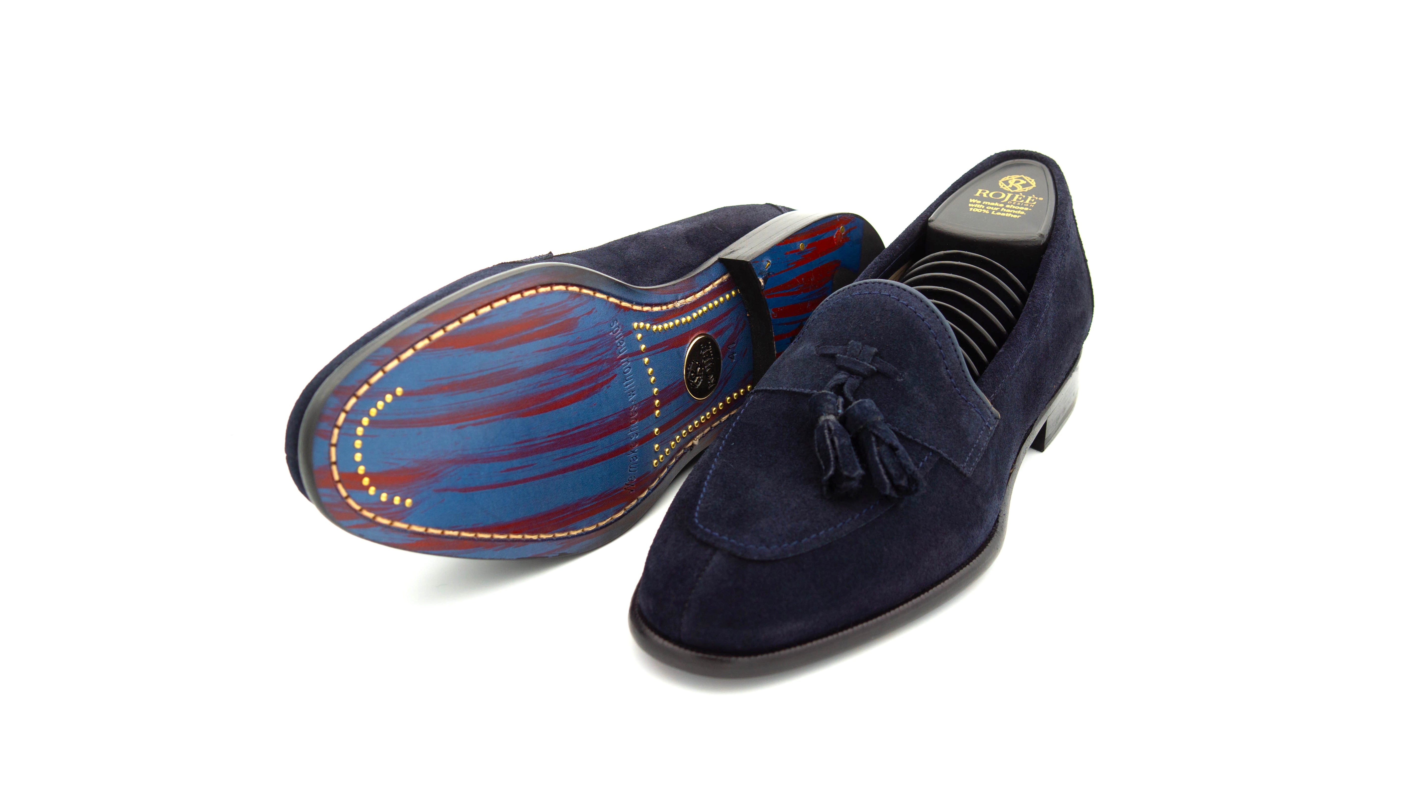 Slipper mit Bommeln