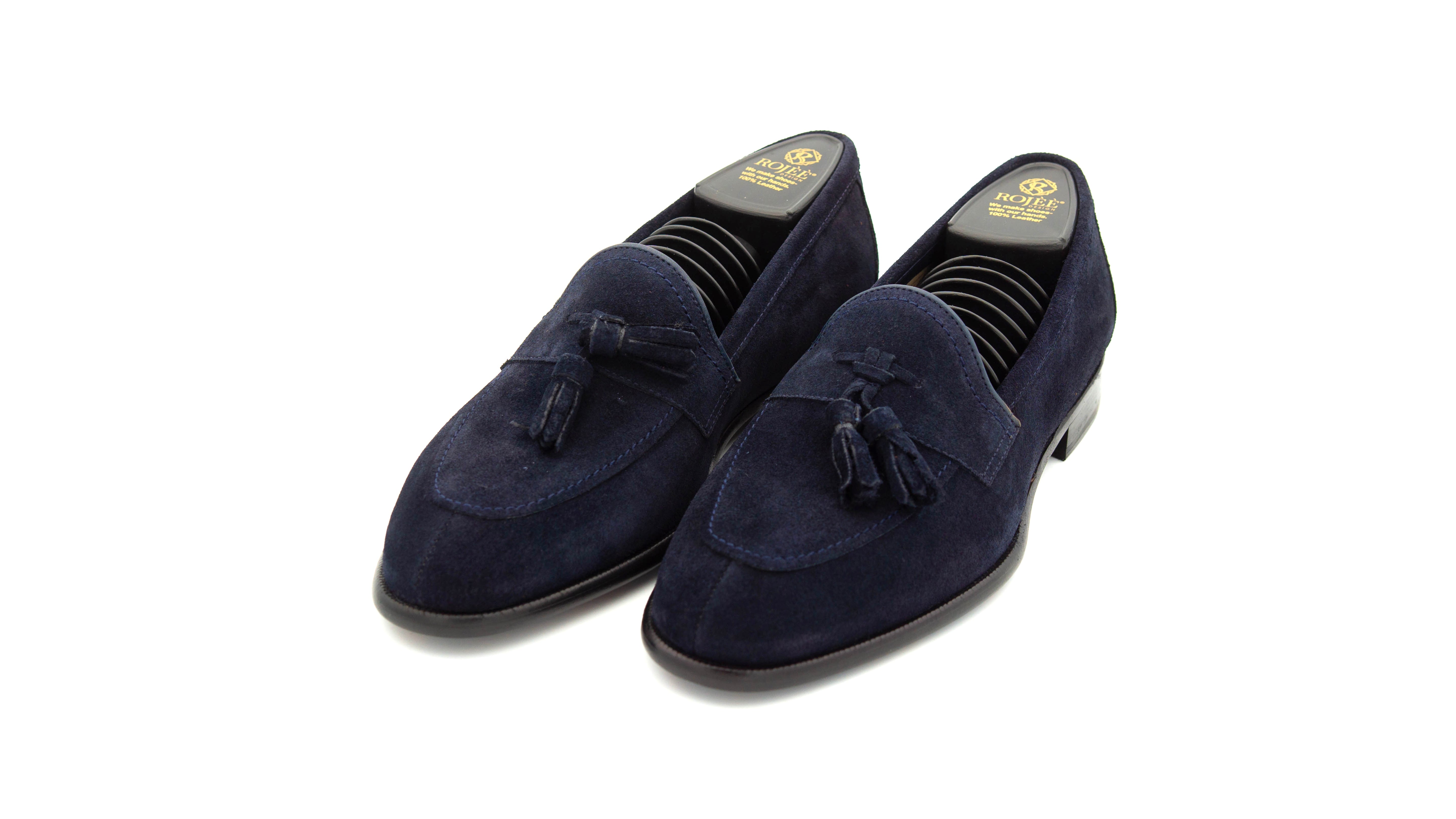 Slipper mit Bommeln