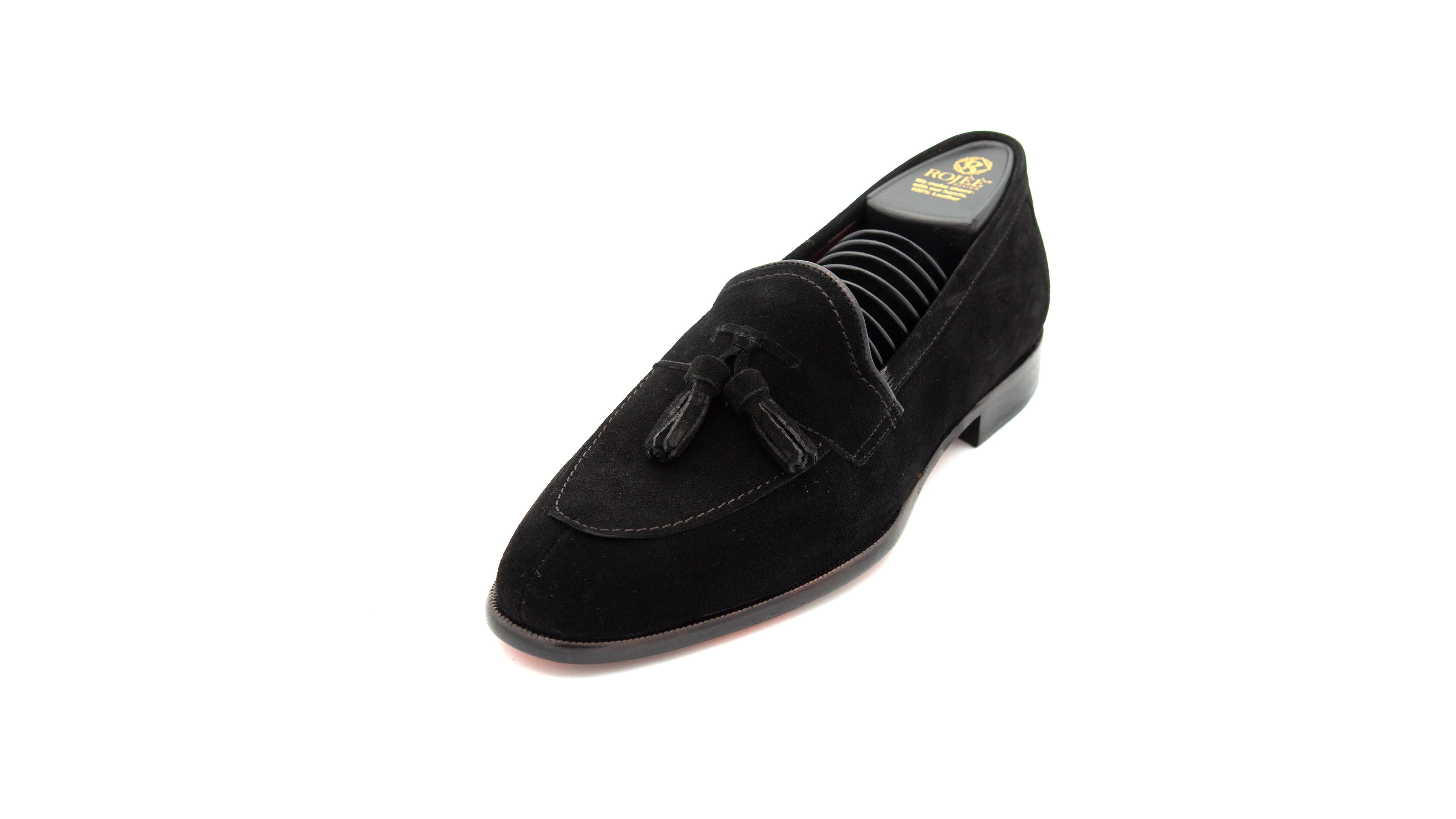 Slipper mit Bommeln