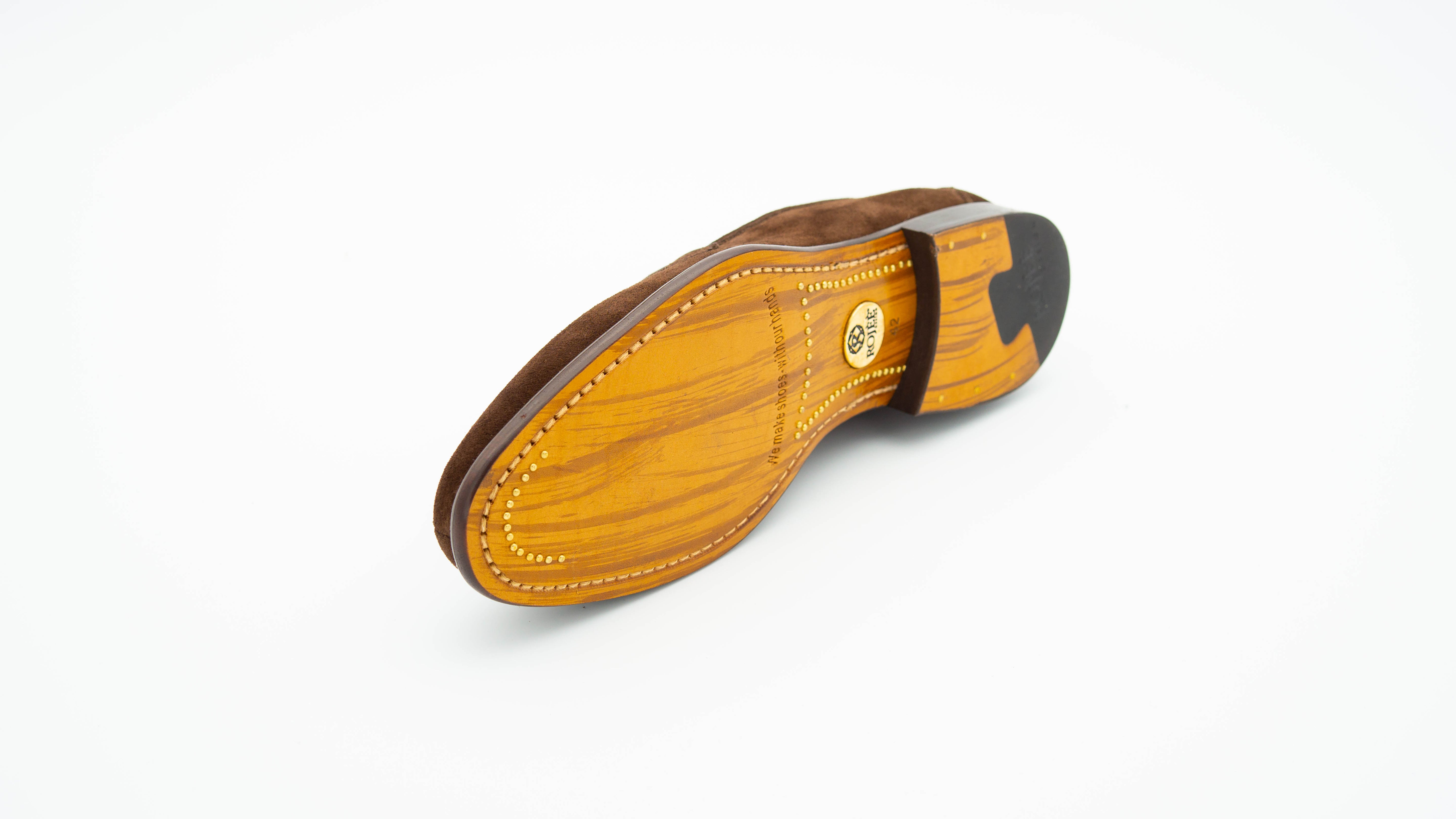 Slipper mit Bommeln