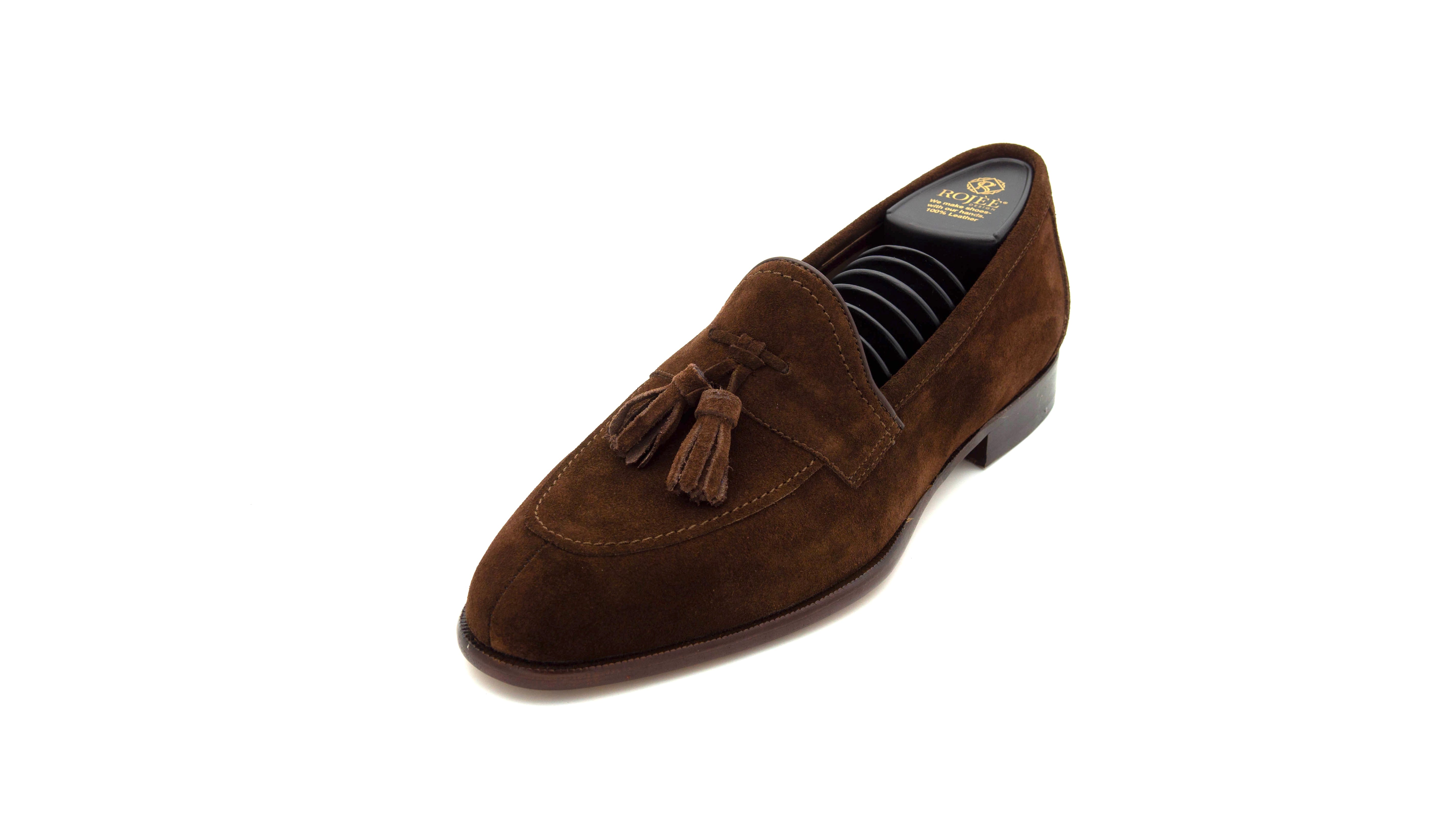 Slipper mit Bommeln