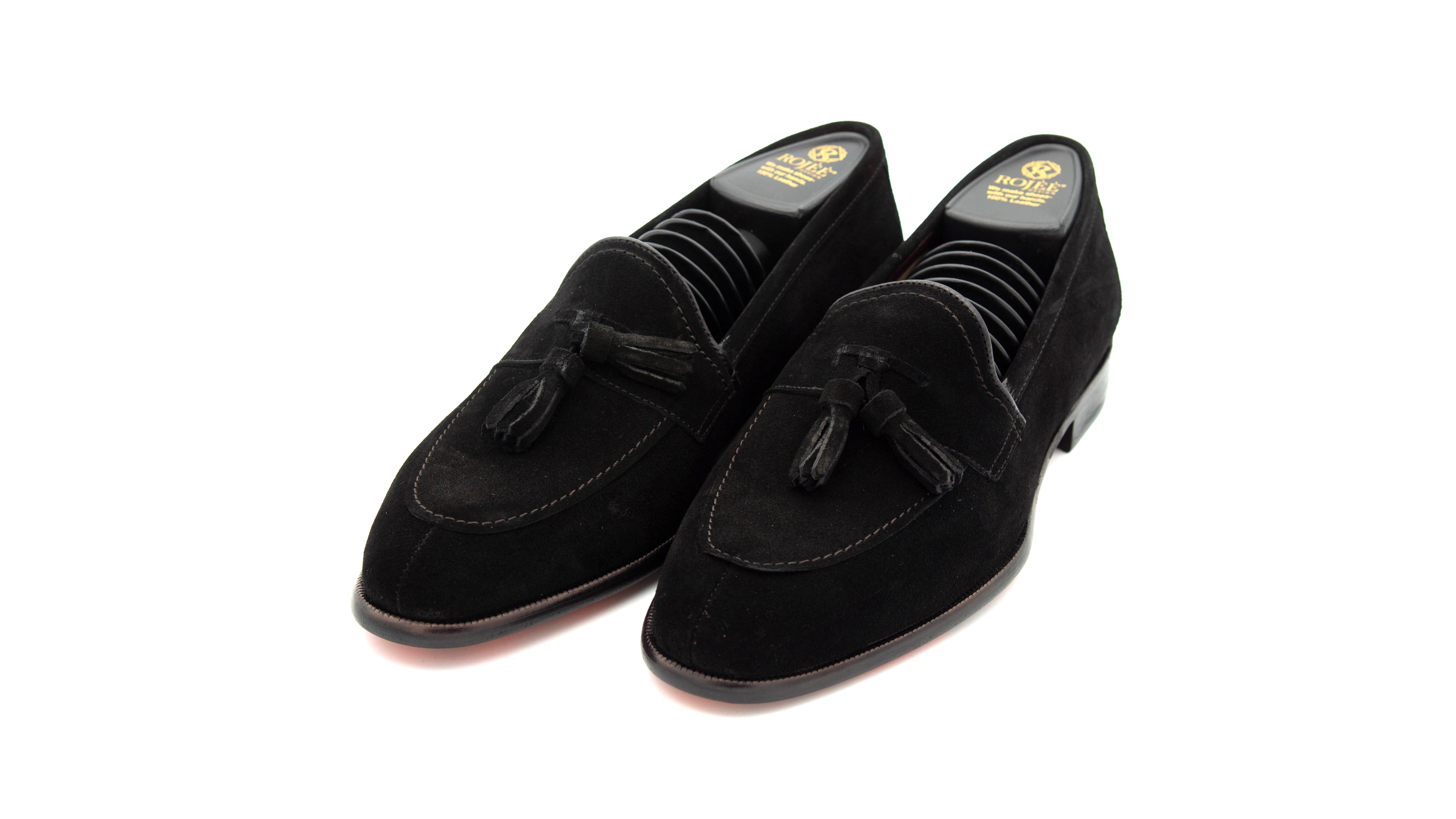 Slipper mit Bommeln