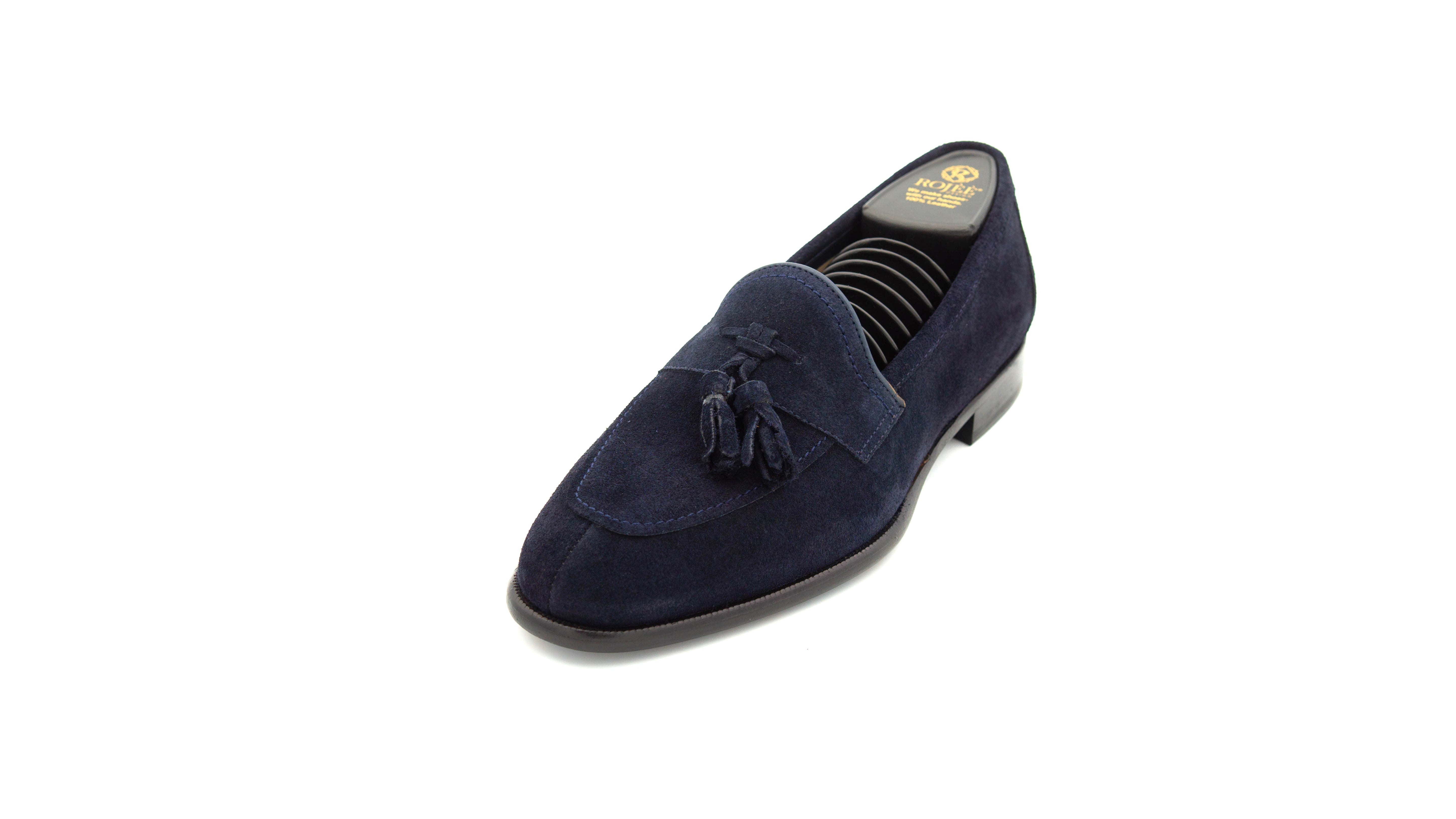 Slipper mit Bommeln