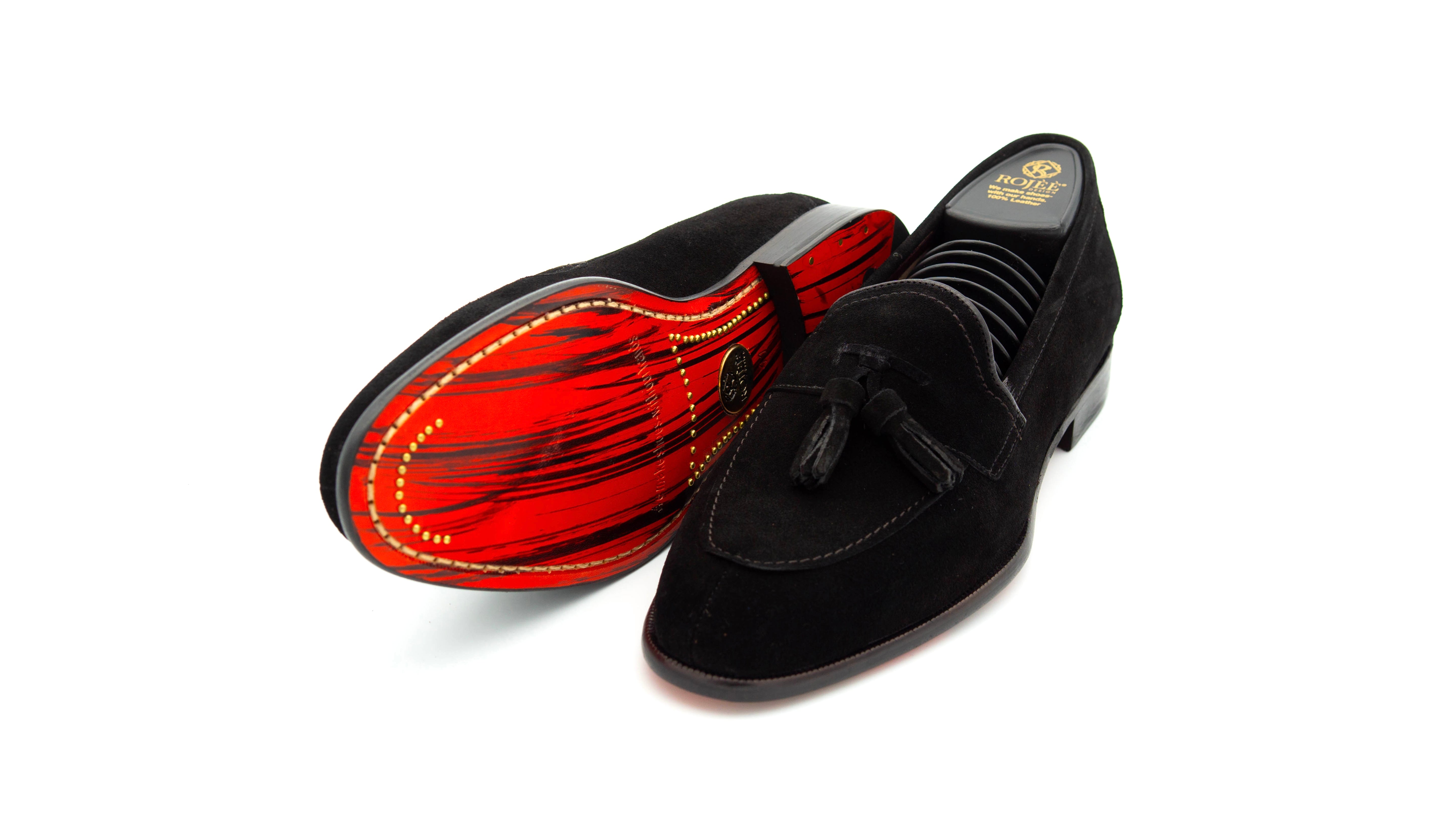 Slipper mit Bommeln