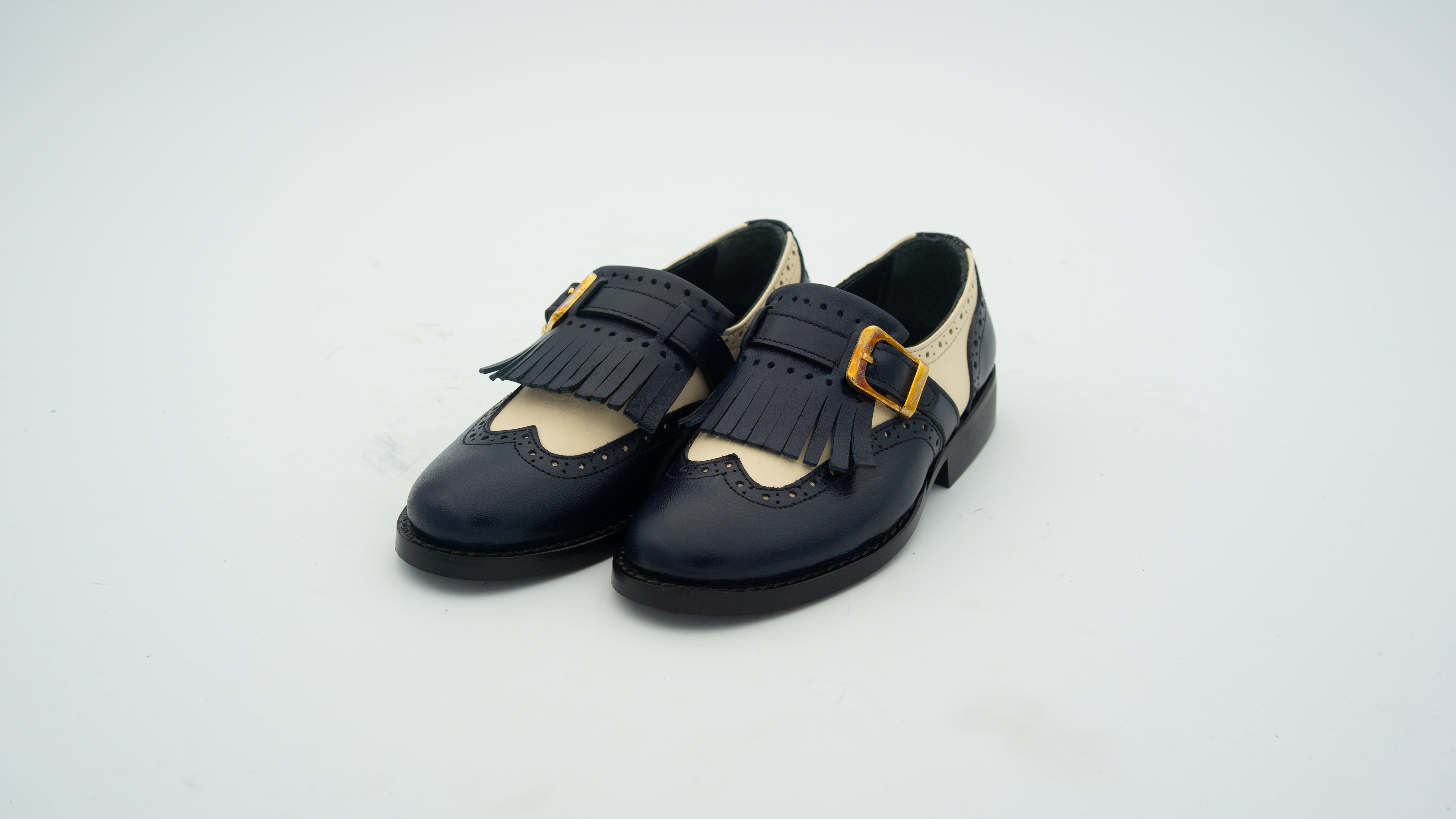 Slipper mit Fransen aus Leder