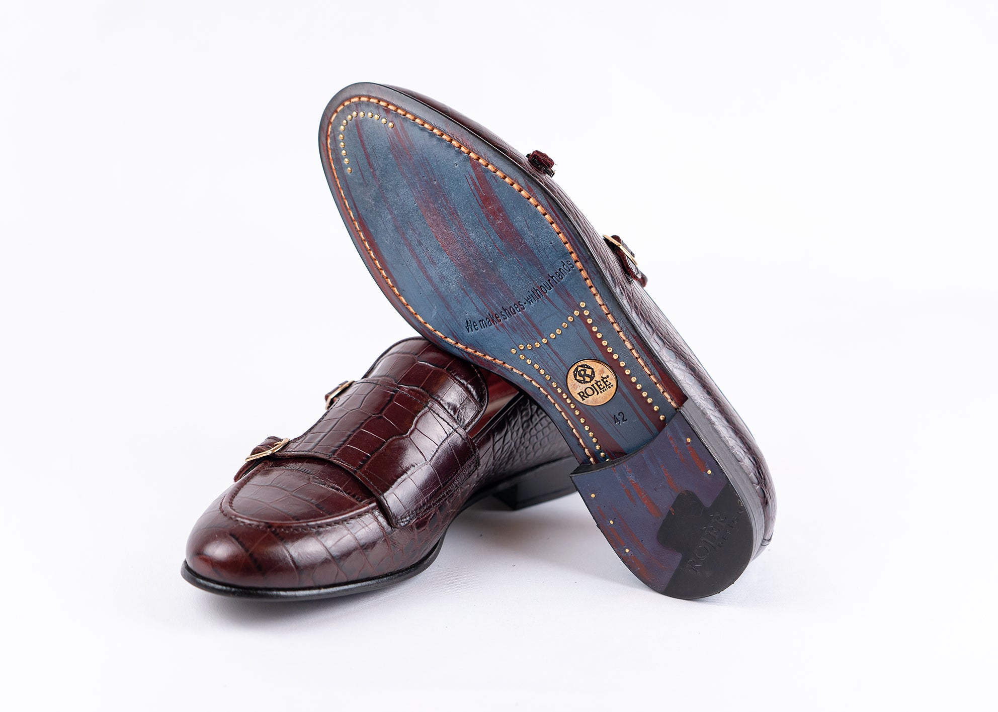 Slipper mit Crocoprägung ￼