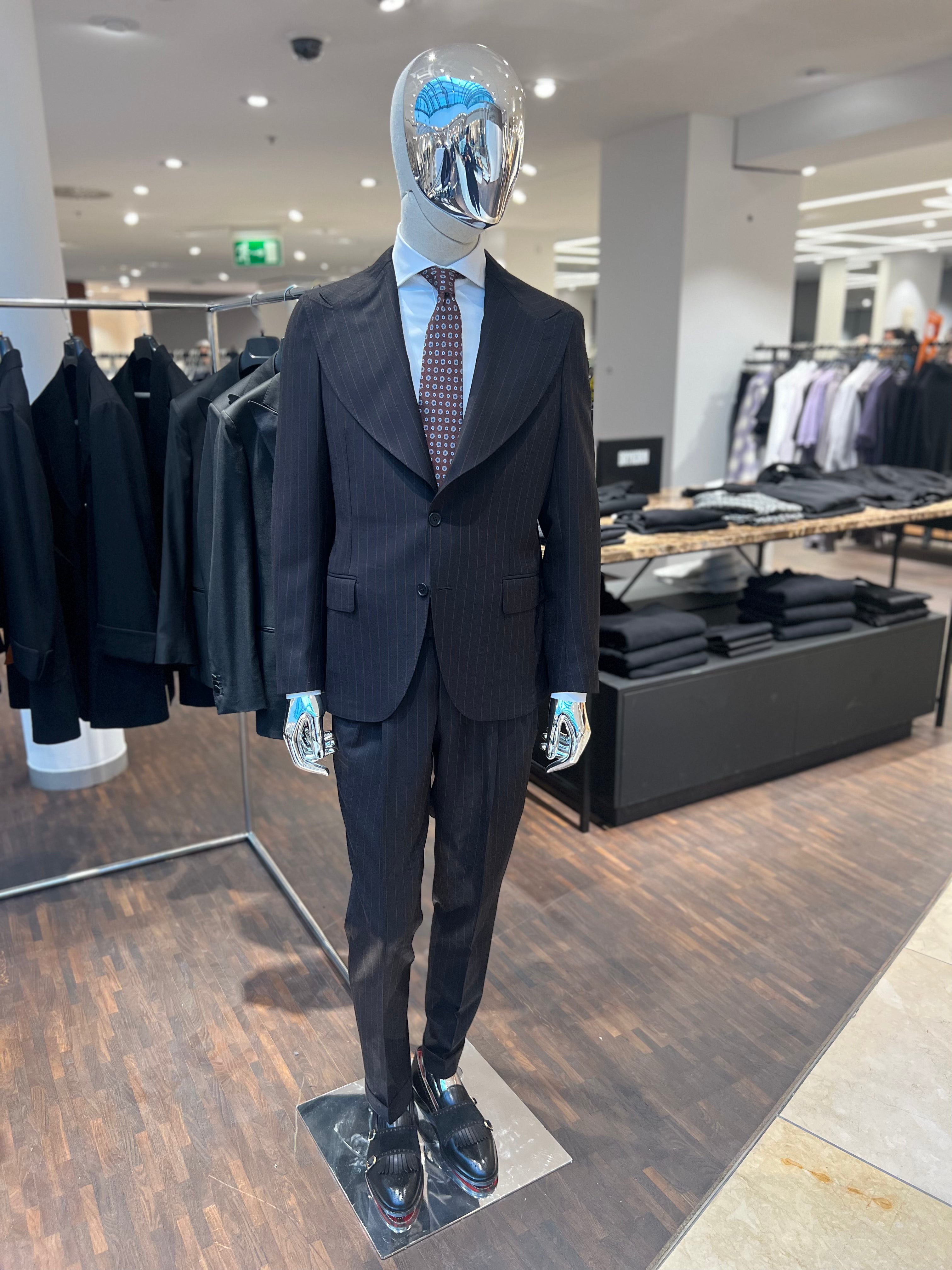 Single-breasted suit in brown with pinstripes